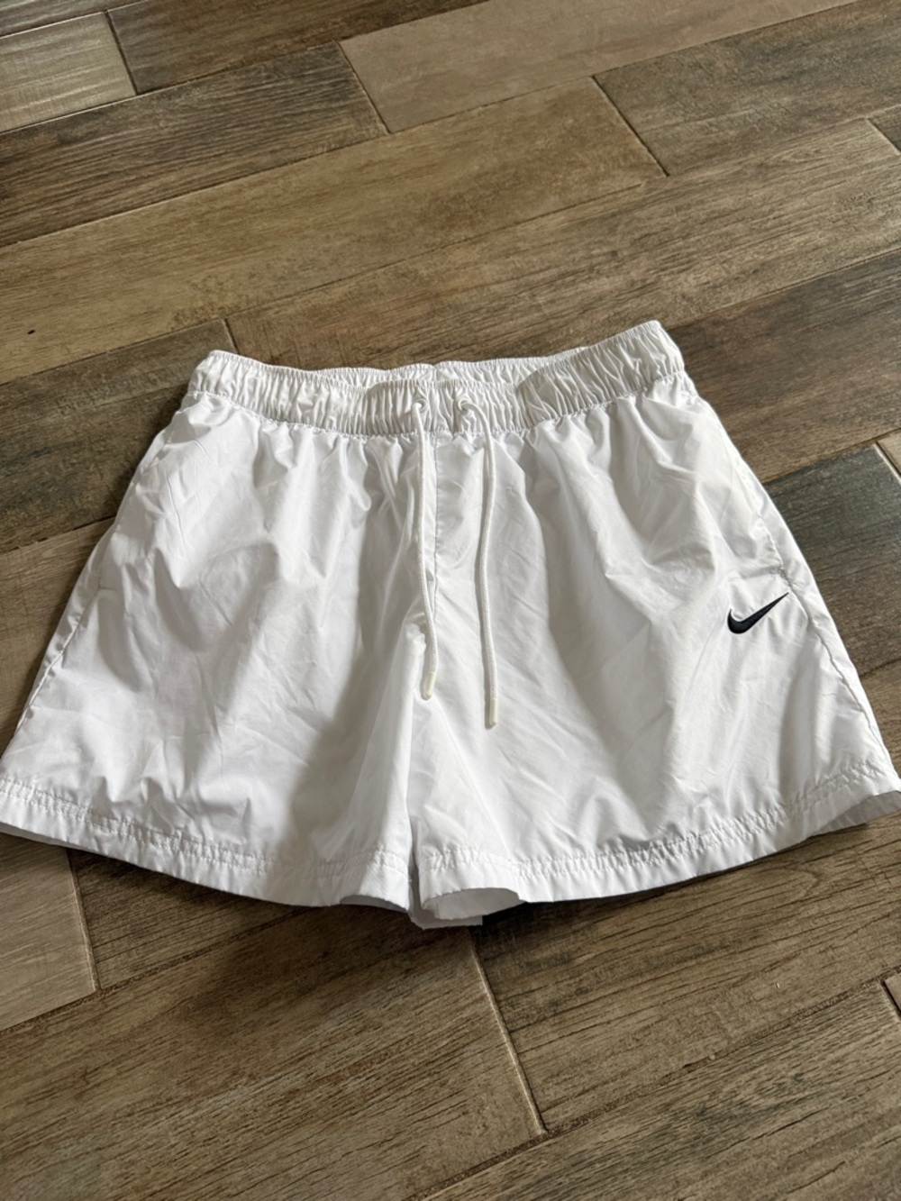 Nike White Shorts with Black Swoosh